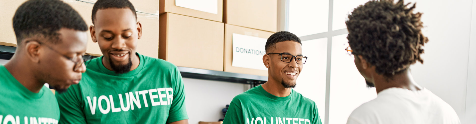 group of volunteers in green shirt