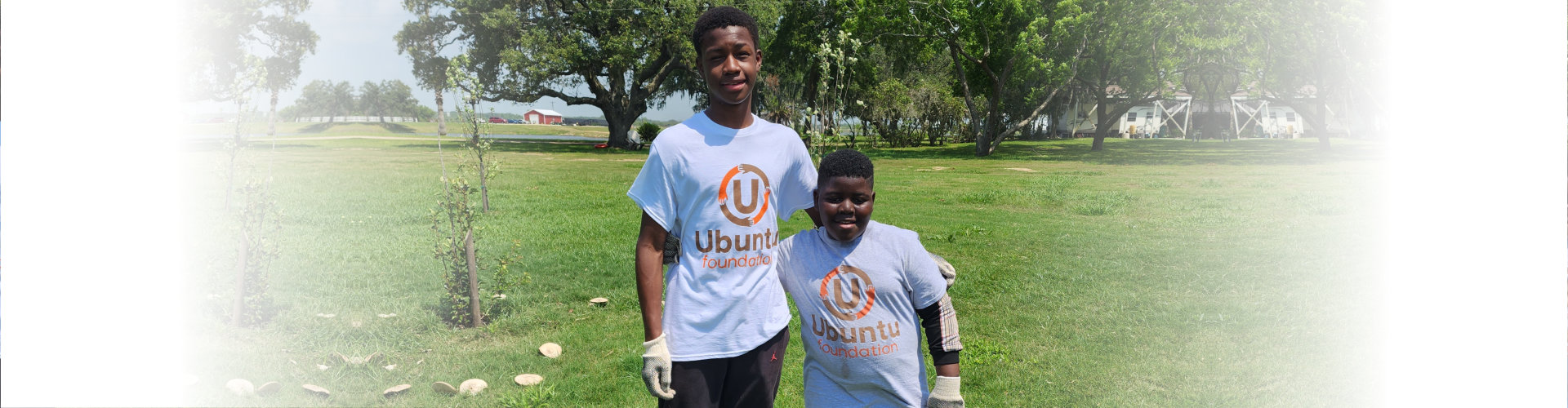 2 young fellows planting trees